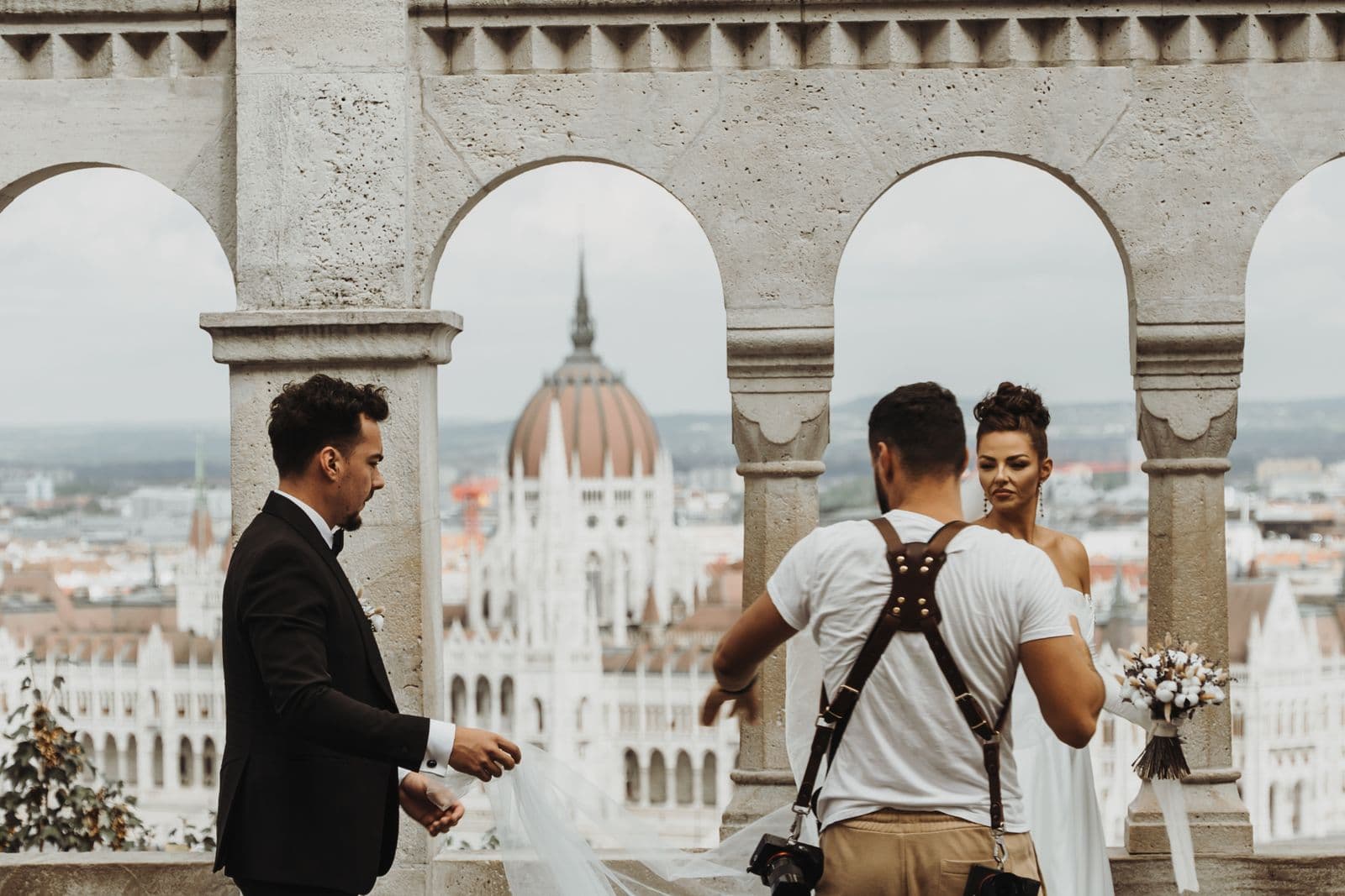 Wedding photographer photographing a couple in Budapest